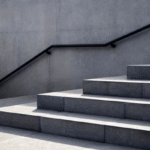 perspective-staircase-railing-on-concrete-600nw-2429977211
